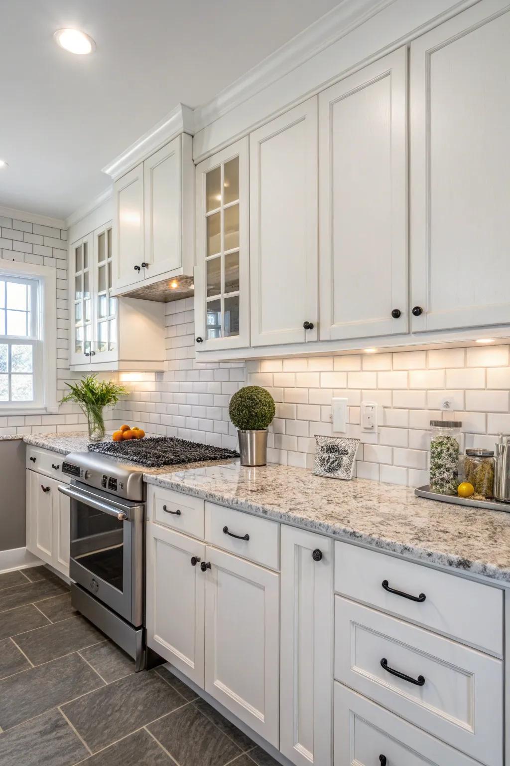 A traditional rectangular tile backsplash is the perfect complement to white cabinets and granite countertops.