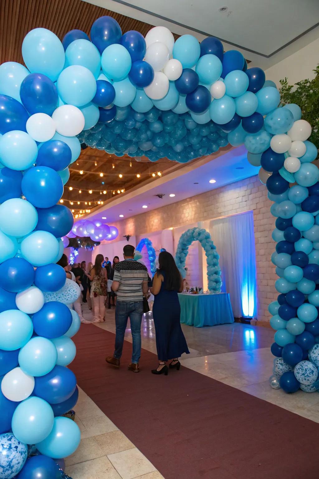A breathtaking blue balloon arch sets a whimsical mood for any festive event.