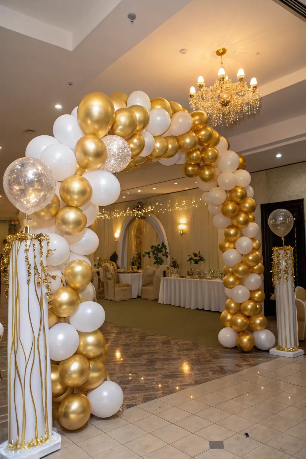 A stunning gold balloon arch serves as an ideal entrance for a birthday celebration.