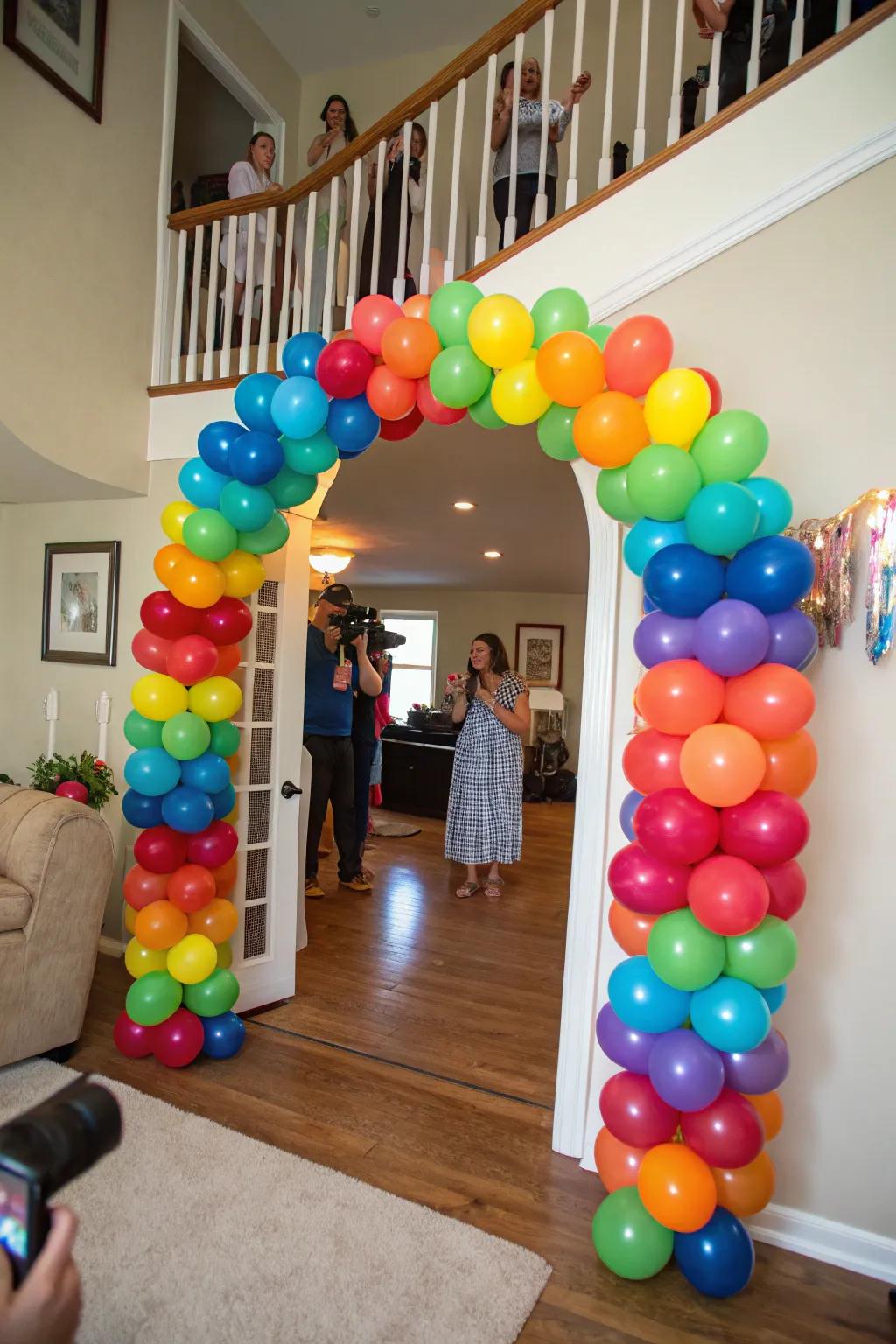 A colorful balloon arch creating a fun atmosphere at the graduation event.