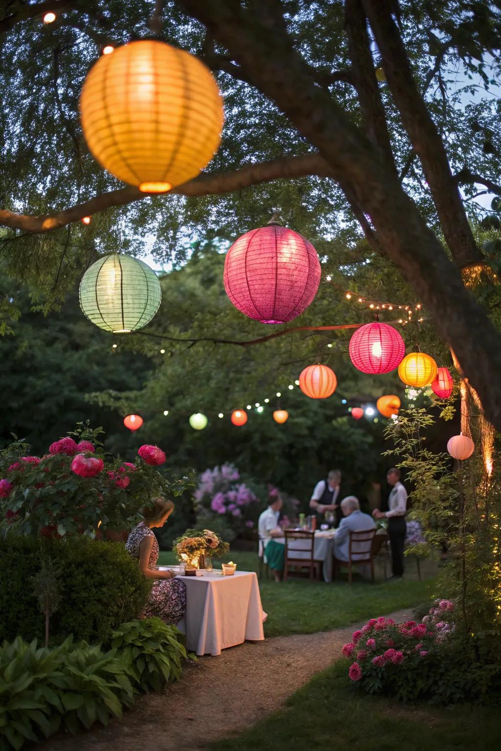 Multihued tissue luminaries create a playful ambiance at a garden party.
