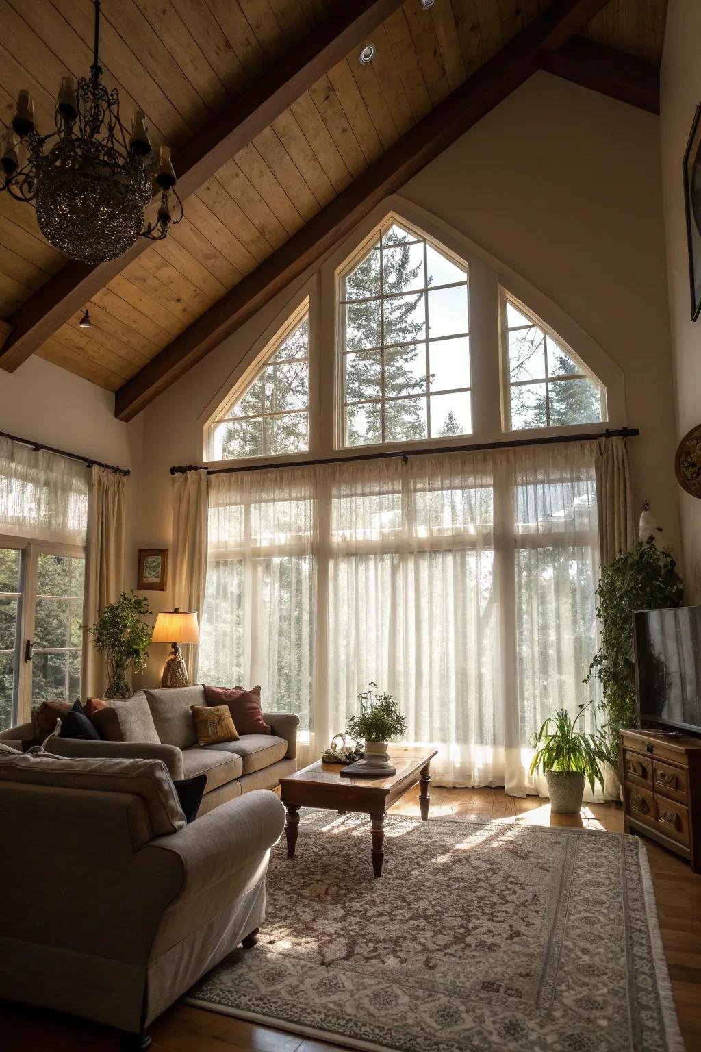 Enjoy natural light with airy curtains in a vaulted ceiling living space.