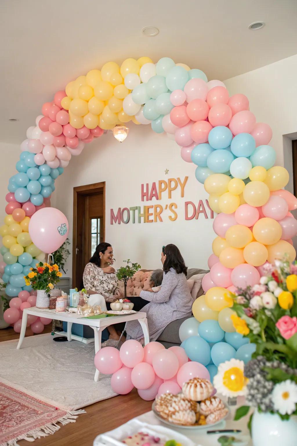 A vibrant pastel balloon arch, perfect for a Mother's Day celebration.