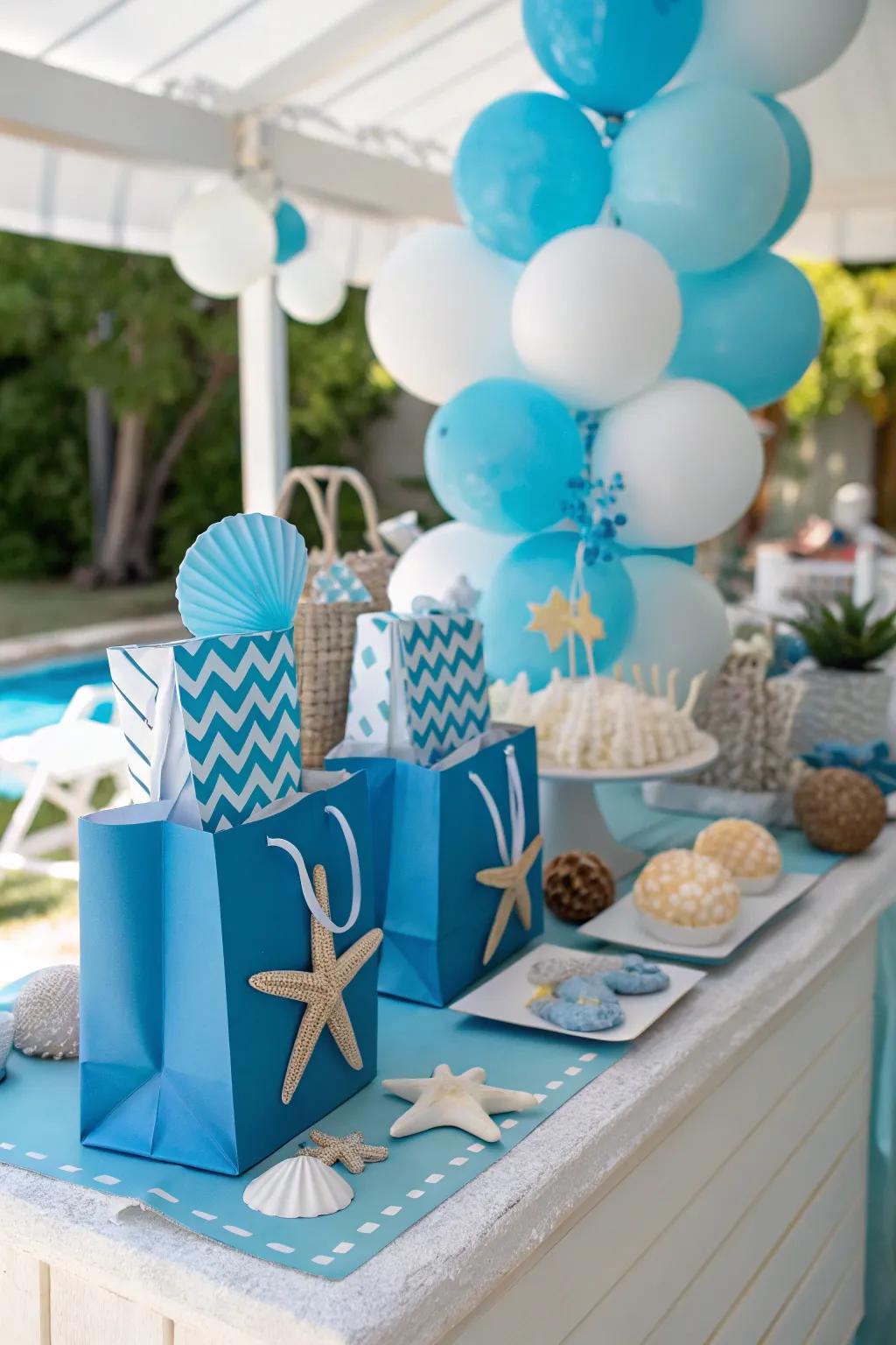 Party favor table featuring a coordinated color scheme inspired by the sea.