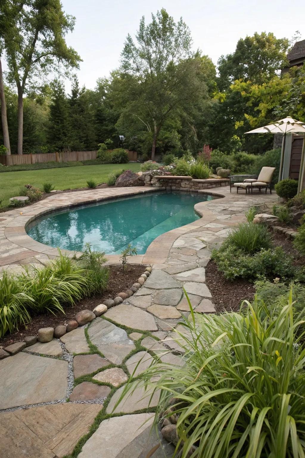 A fluid pool nestled in a natural backyard environment.