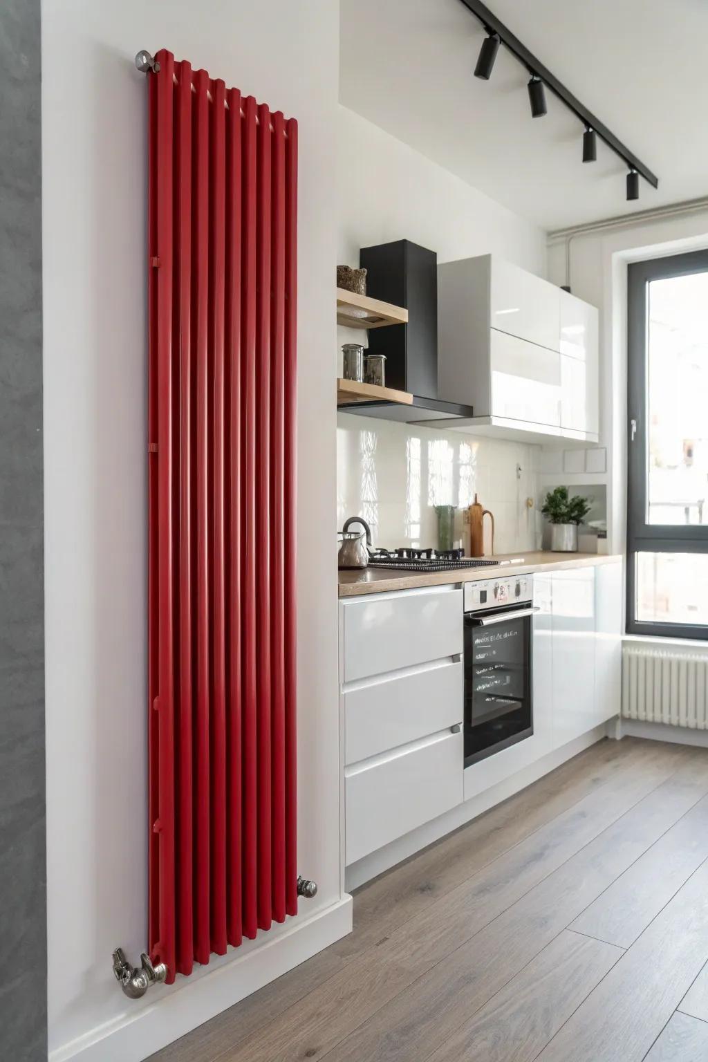 A vibrant crimson radiator infuses passion into a neutral kitchen.