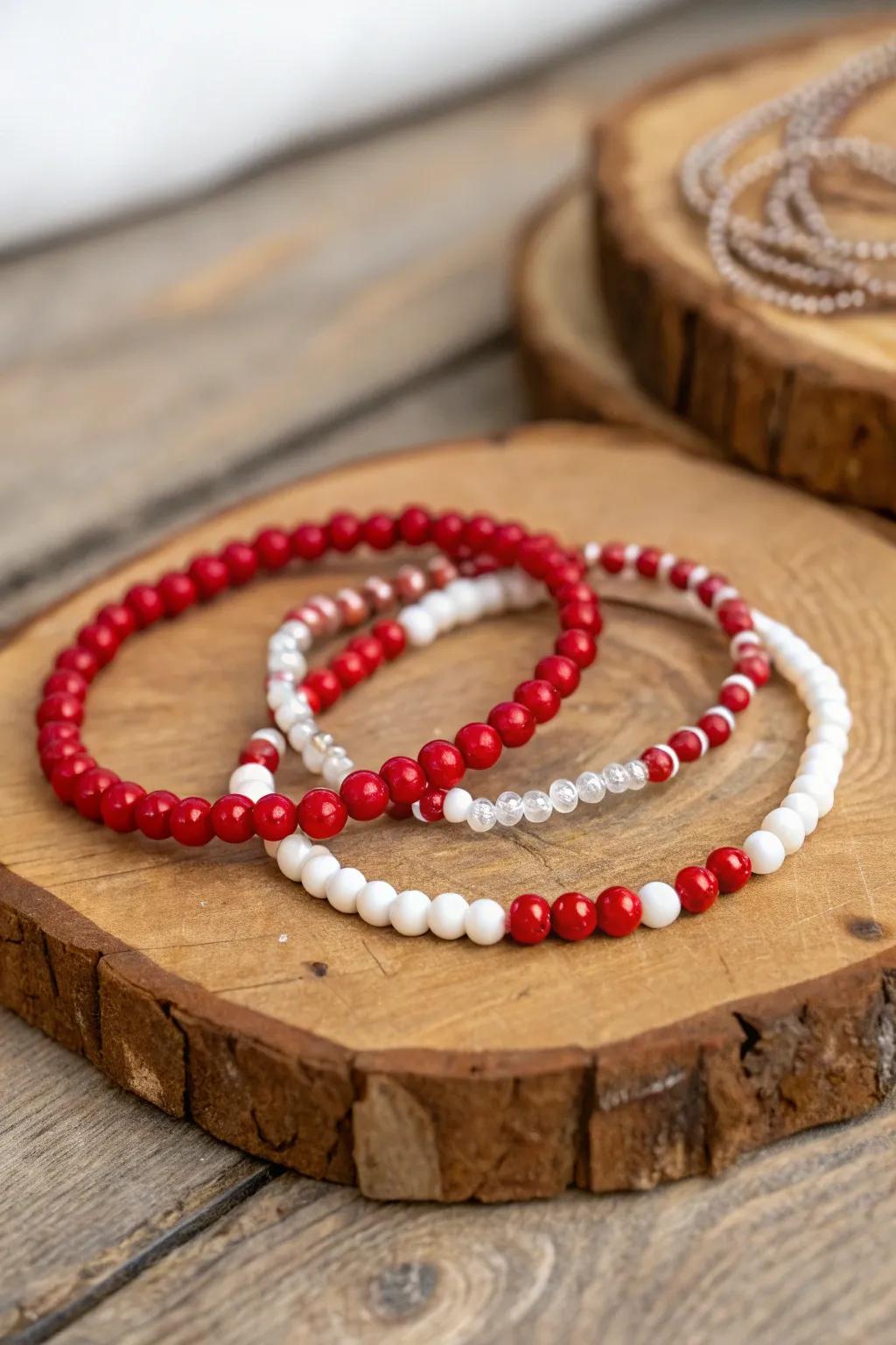 Chic scarlet and ivory beaded wristlets enhance any ensemble.