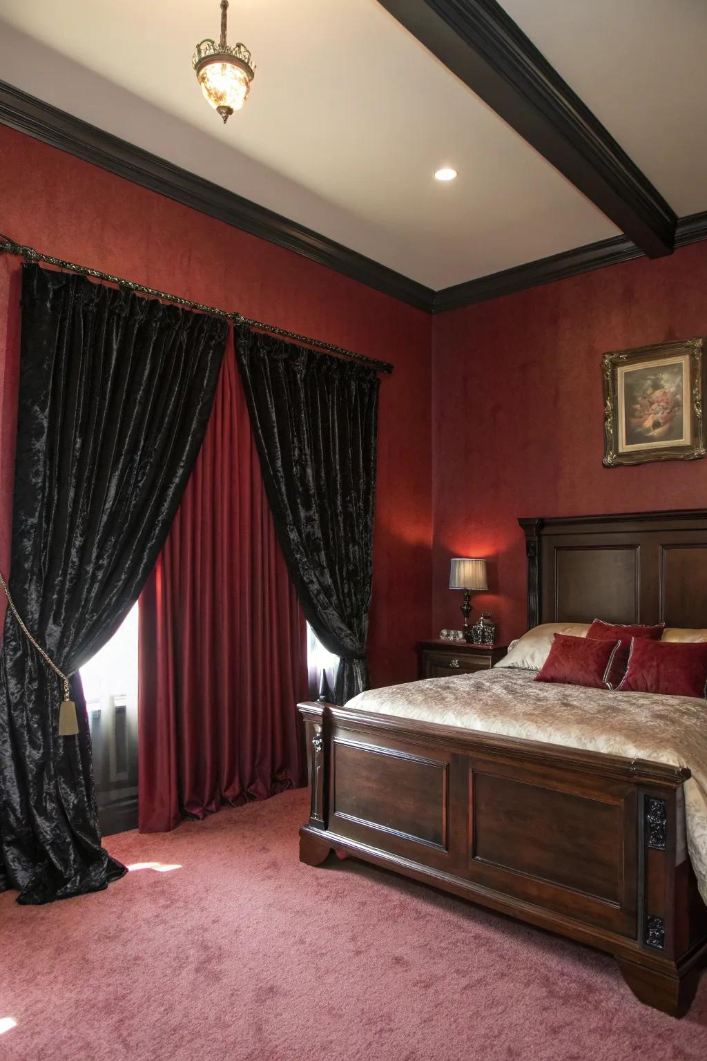 Walls painted a rich red and drapes of black velvet craft a dramatic Victorian Gothic setting.