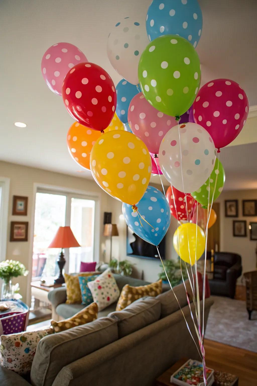 A living space transformed into a vibrant balloon wonderland, perfect for a toddler's birthday celebration.