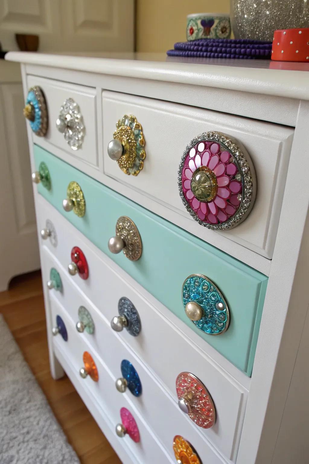 Transform old jewelry into stunning drawer decor.
