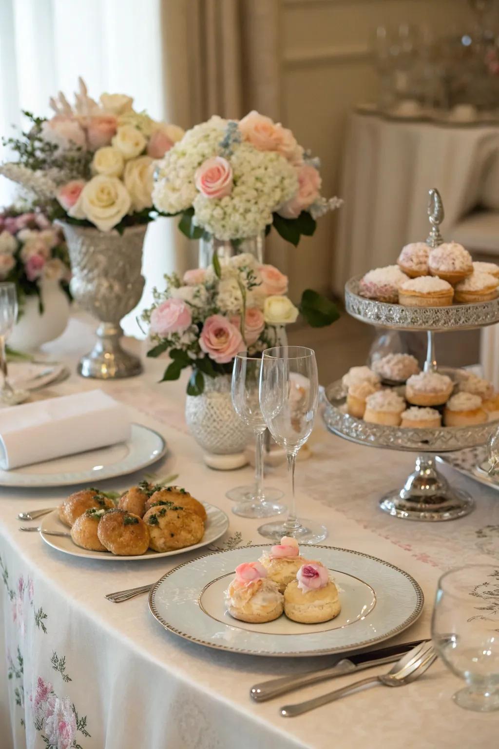 An exquisitely arranged table featuring fresh flowers and a variety of breakfast options.