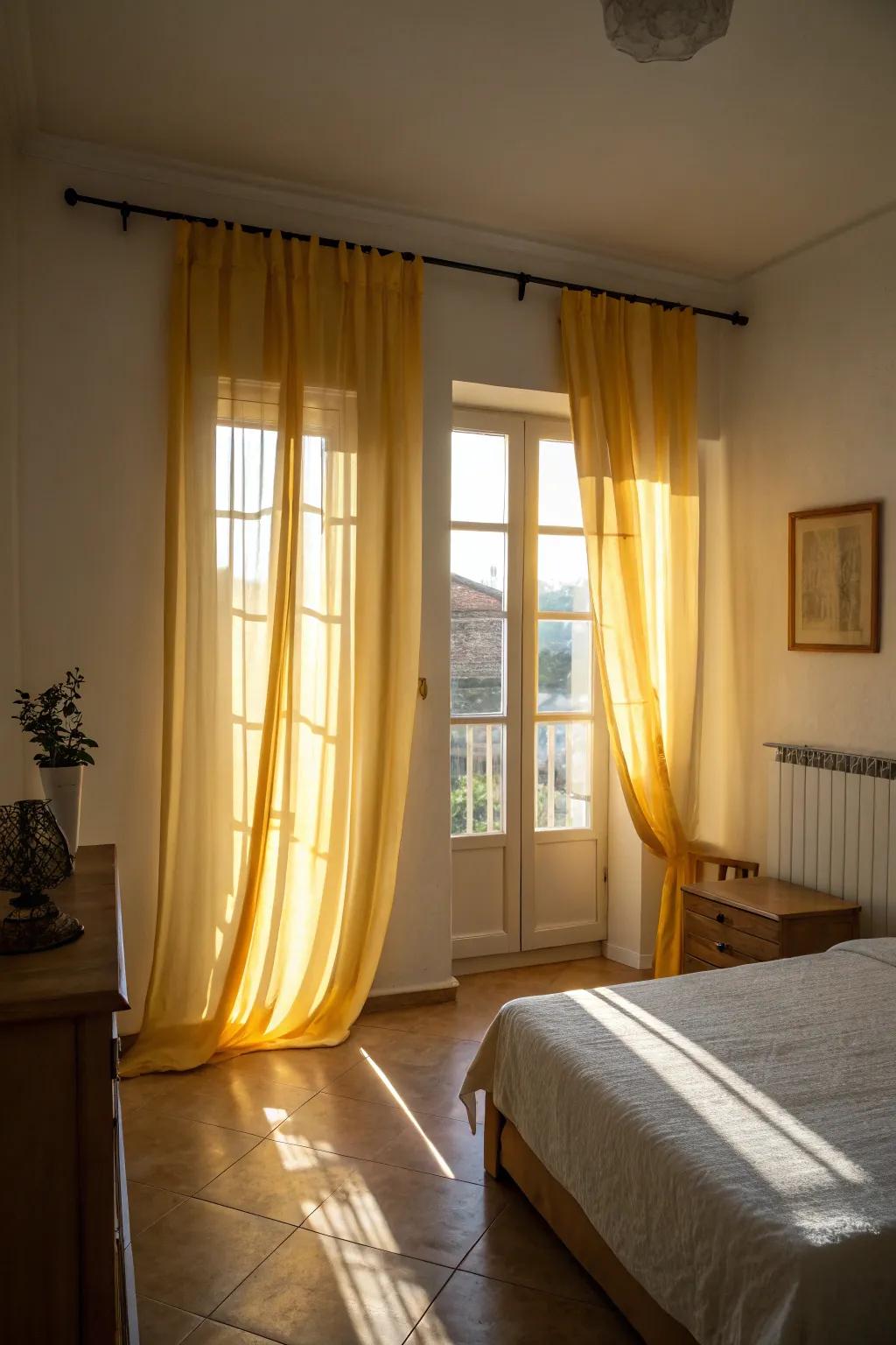 Light gold drapes welcome the sun, crafting an airy and bright ambiance in the bedroom.
