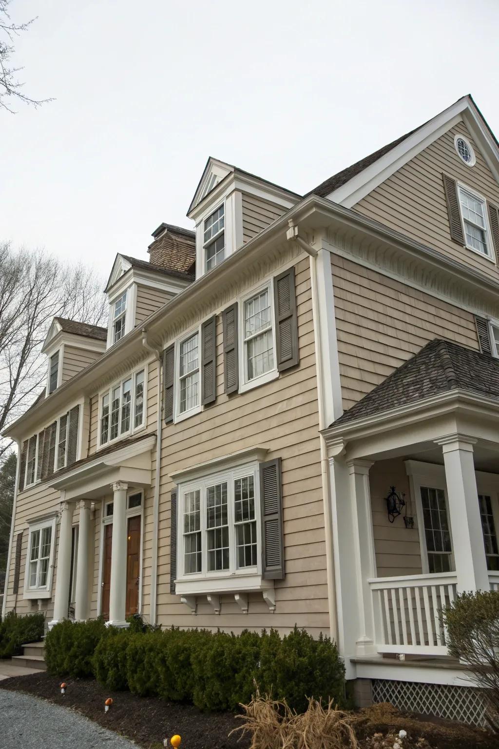 Colonial dwelling sporting taupe and fawn shades.