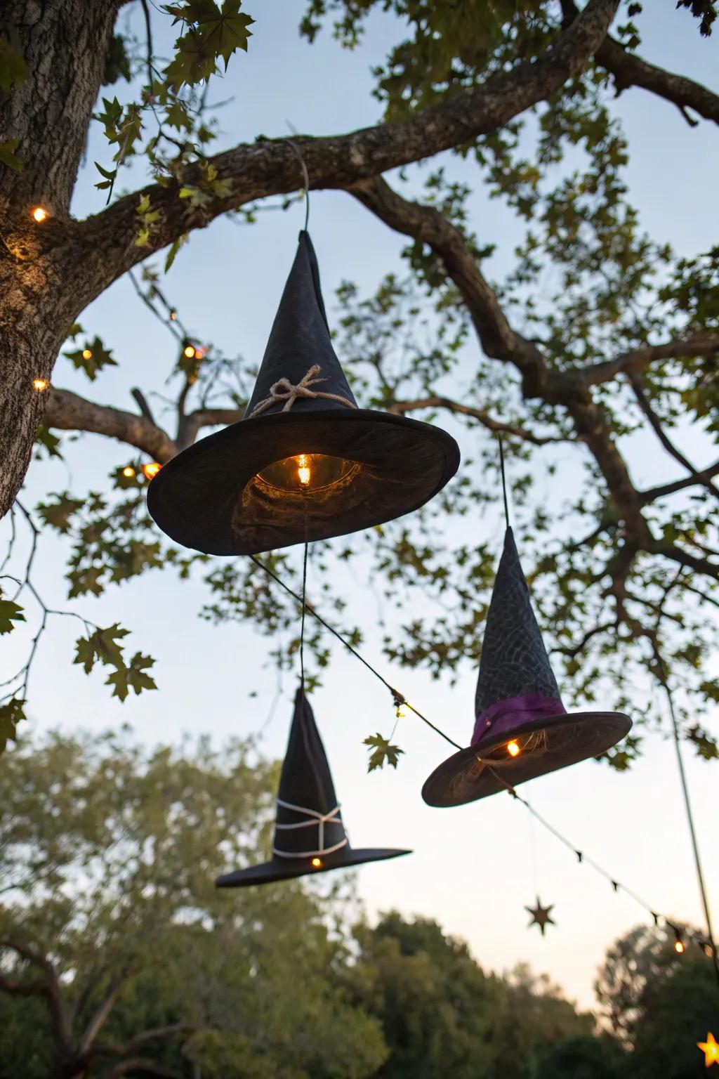 Floating witch hats produce an enchanting and whimsical outdoor display.