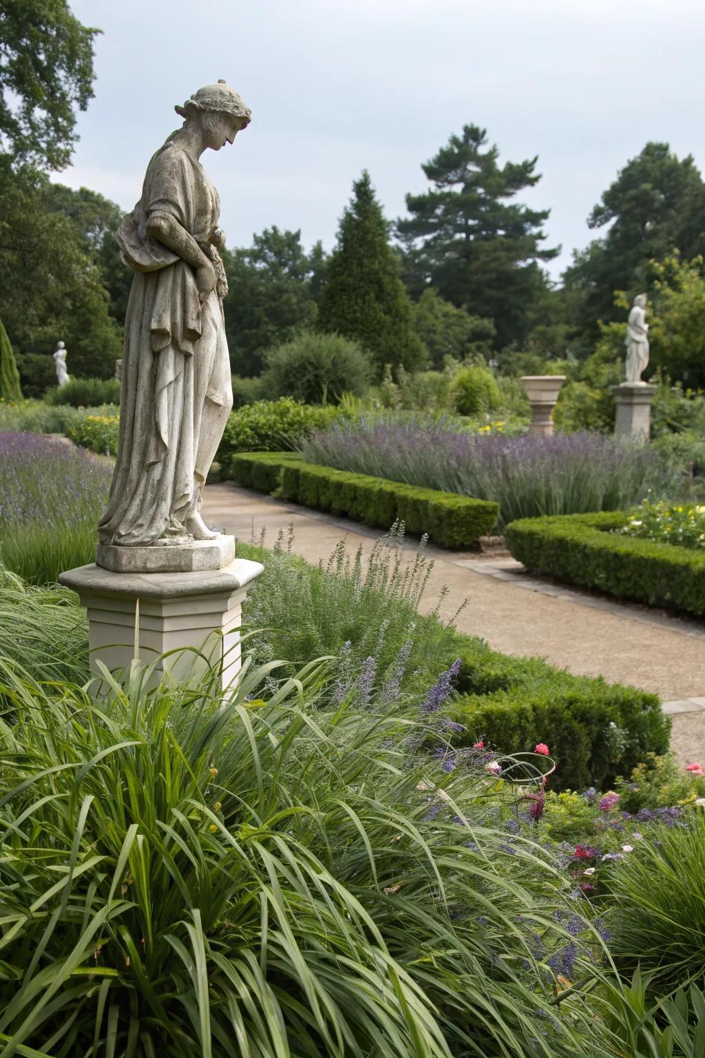 A landscape statue elegantly highlighted by the lavish 'fountaingrass' surrounding it.