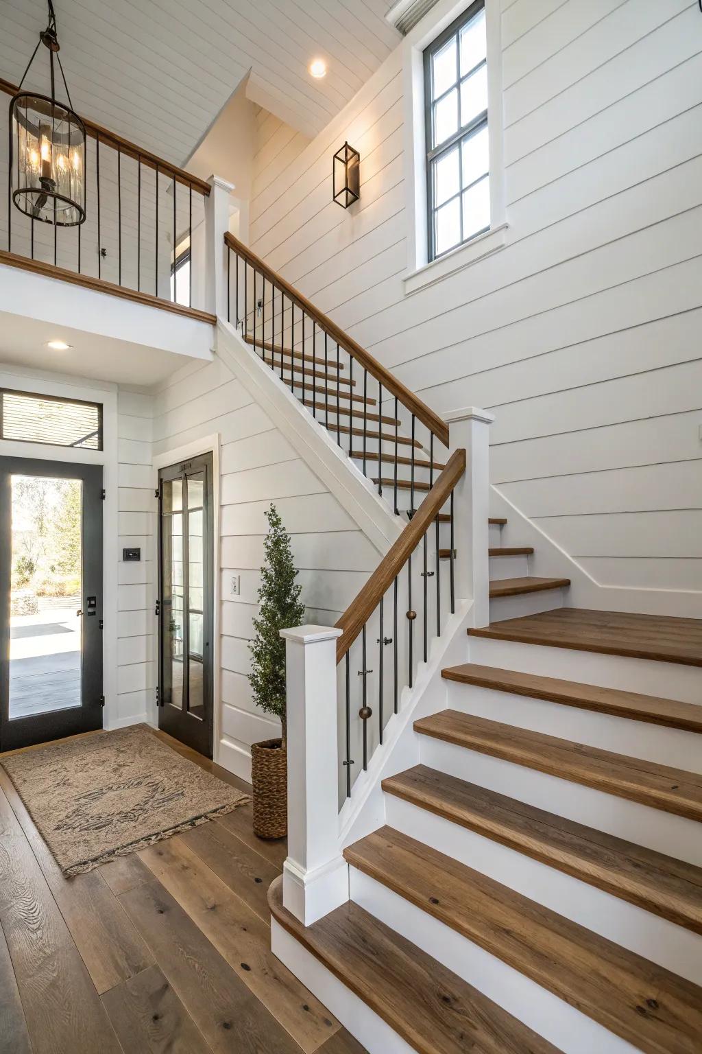 A staircase with a shiplap wall backdrop, adding texture and farmhouse appeal.