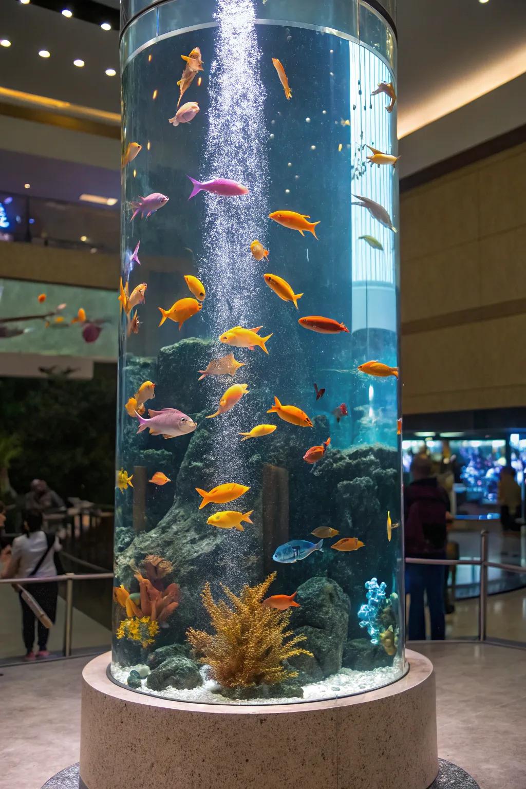 A vibrant gathering of fish in a towering tank.