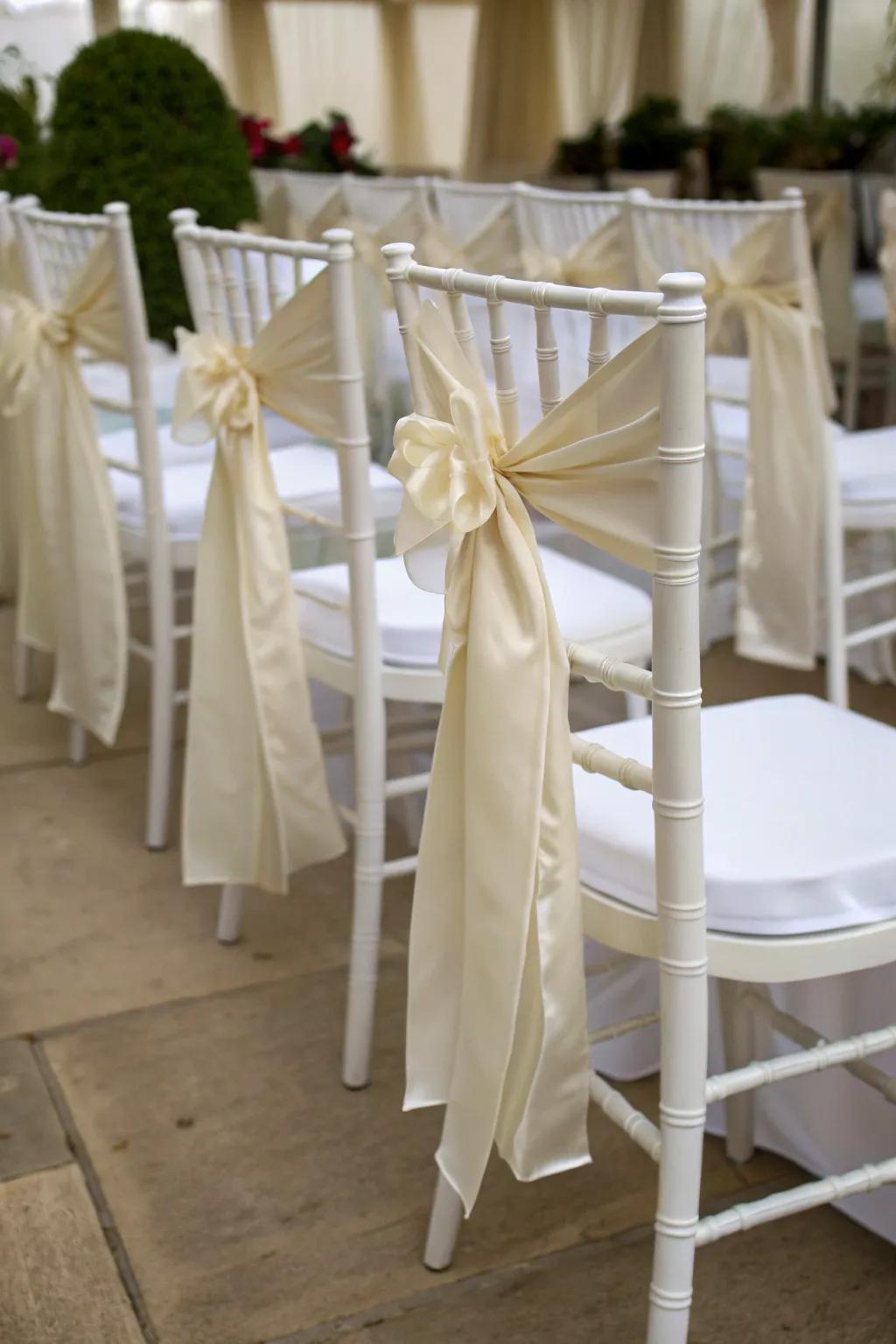 Silk ribbons add a romantic touch to chairs.