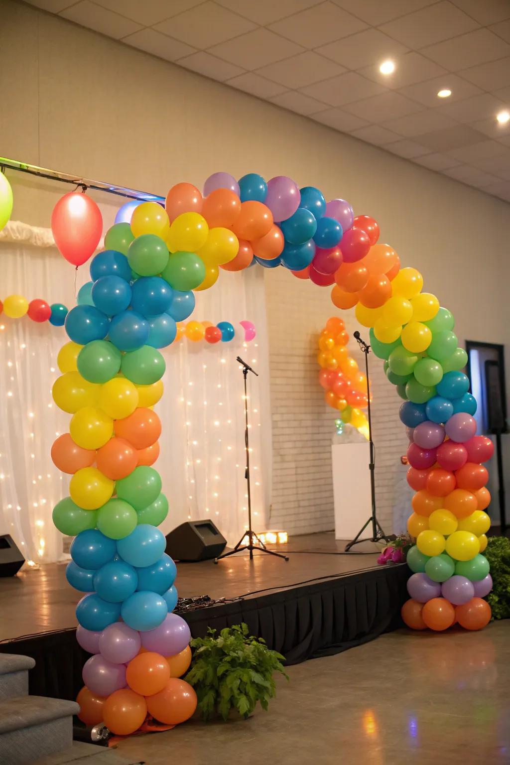 Festive balloon garlands imparting color and elation to the stage.