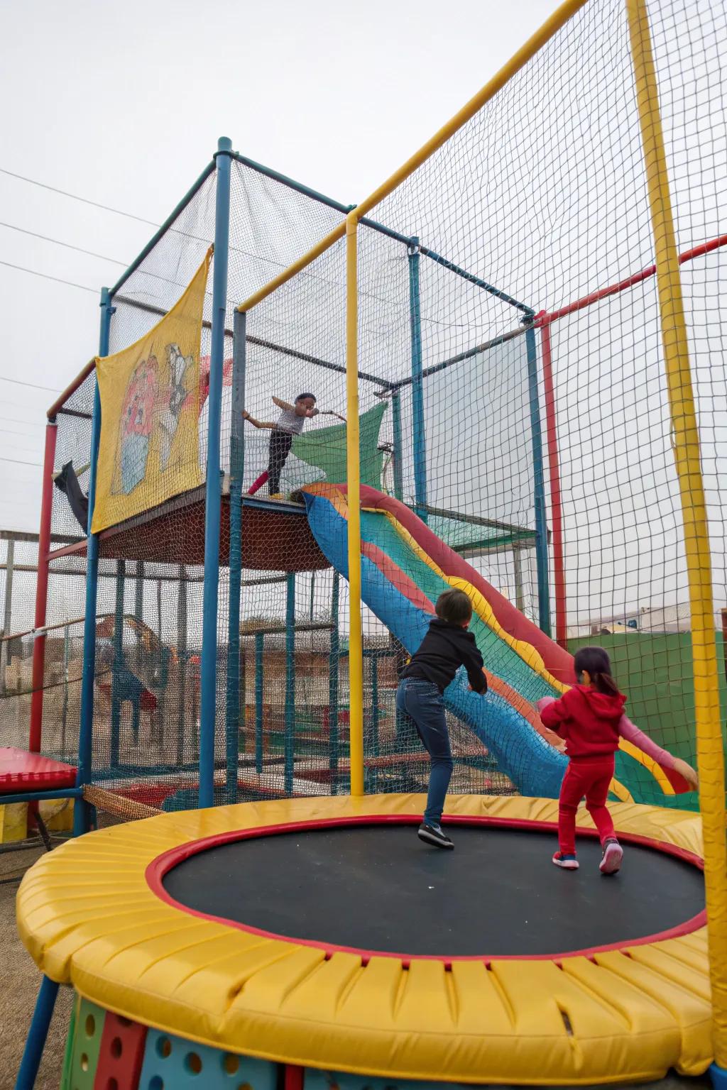 An exciting enclosed play paradise surrounding a bouncer.
