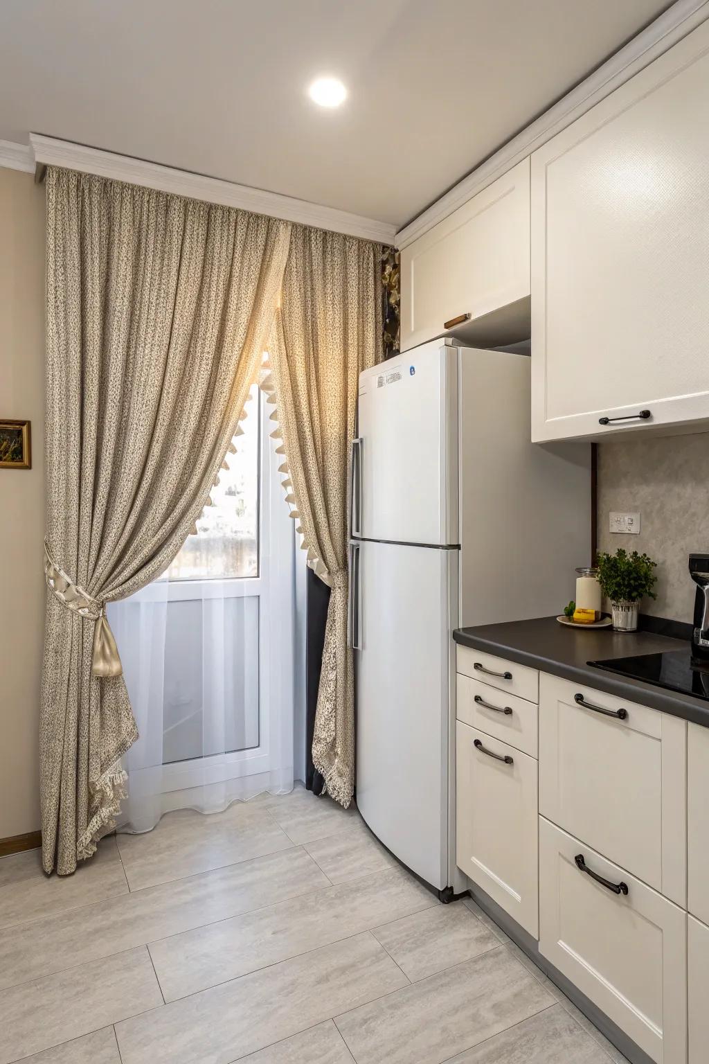 A drape tastefully conceals the area above the fridge.