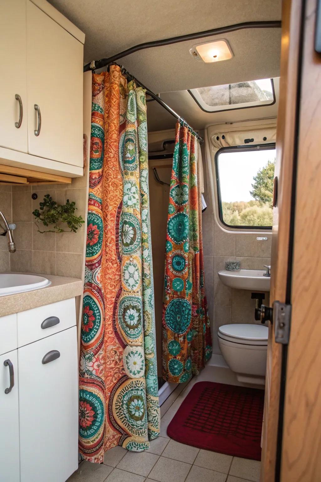 A colorful and patterned shower curtain in a camper van bathroom.