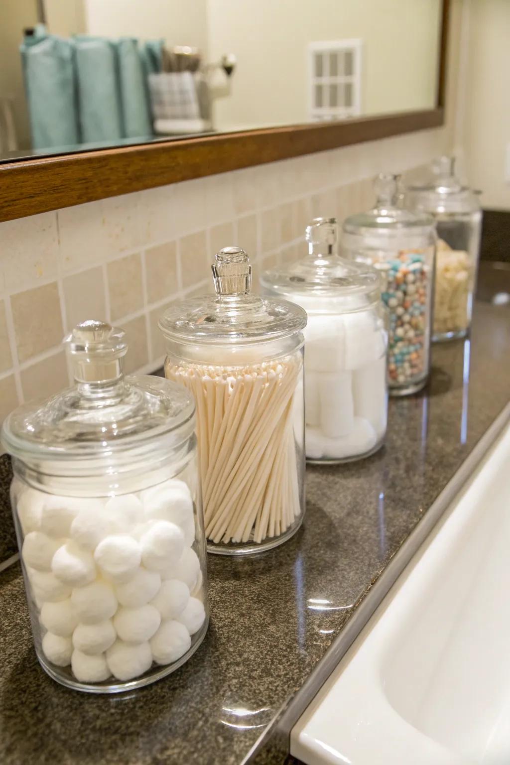Glass jars are a pretty way to keep your little bits in order.