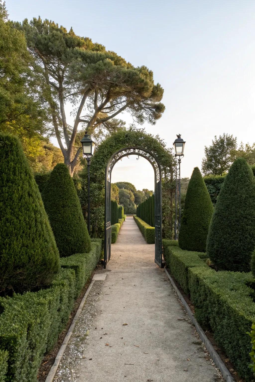 Symmetrical shrub plantings create an inviting and grand garden entrance.