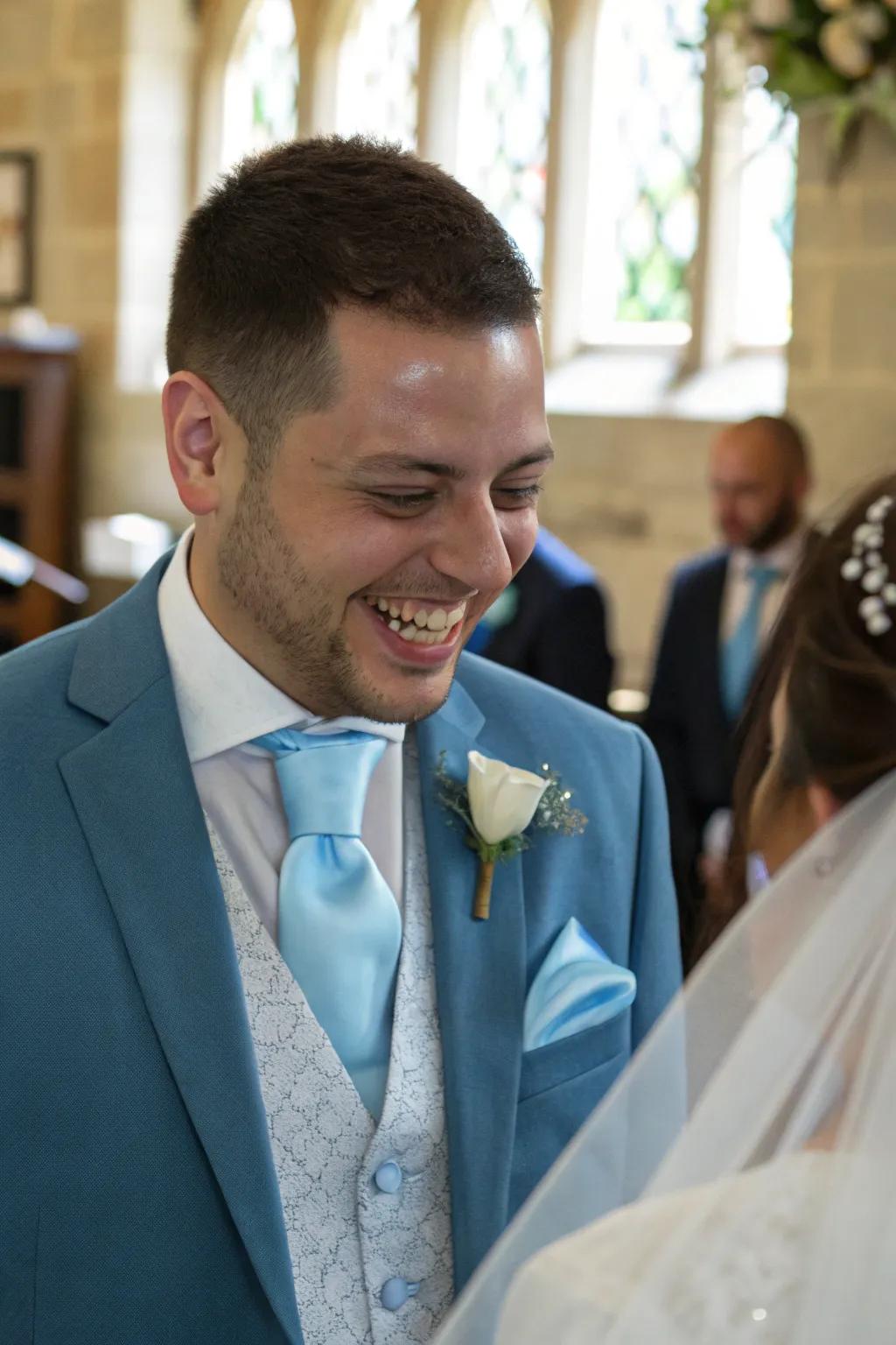 Pale azure accessories contribute a stylish nuance to the groom's attire.