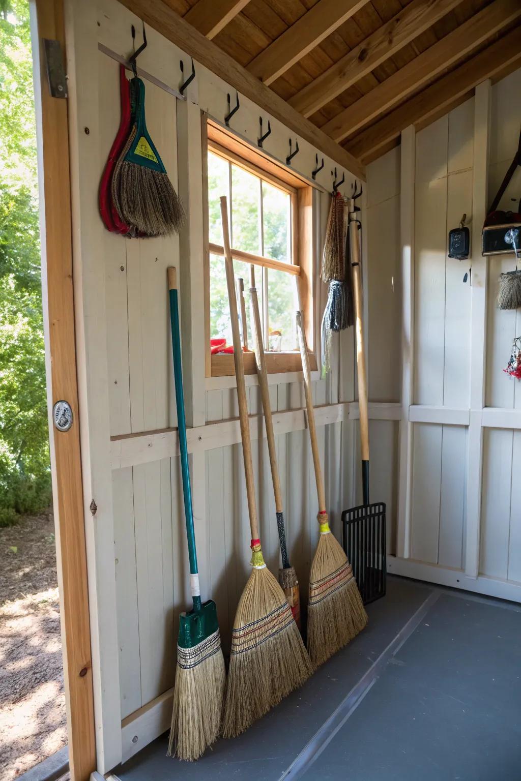 Keeping floors clear with overhead broom storage.