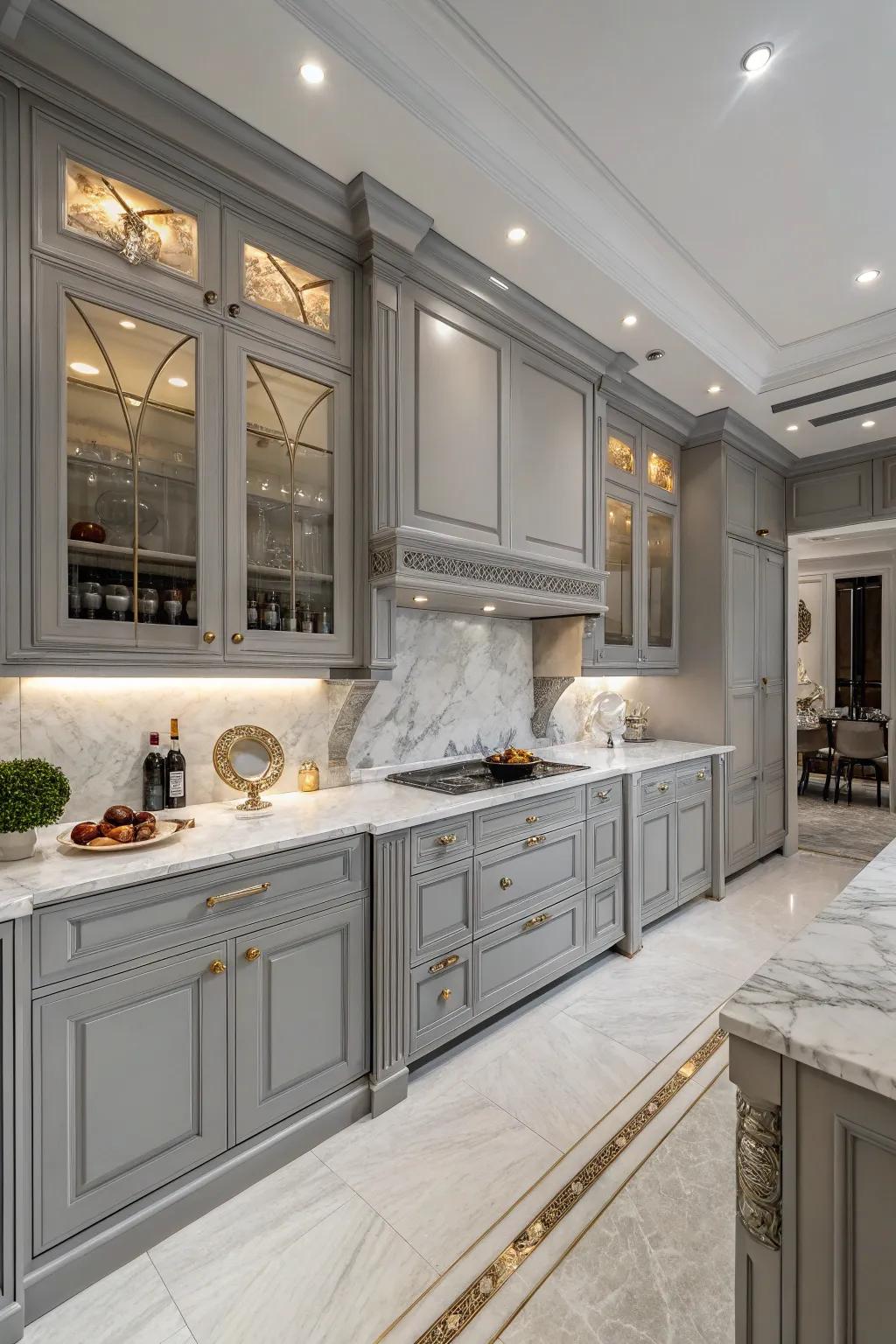 Alabaster worktops bestow luxury and elegance upon gray cabinets.