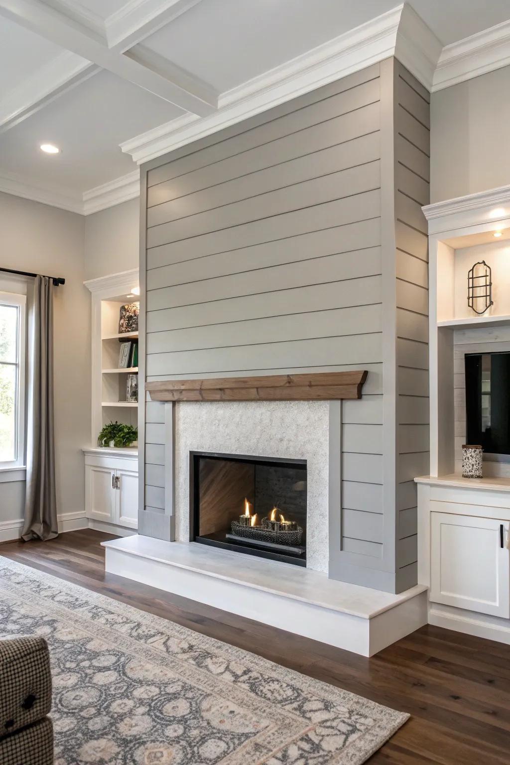 A monochromatic shiplap fireplace in a modern living room.