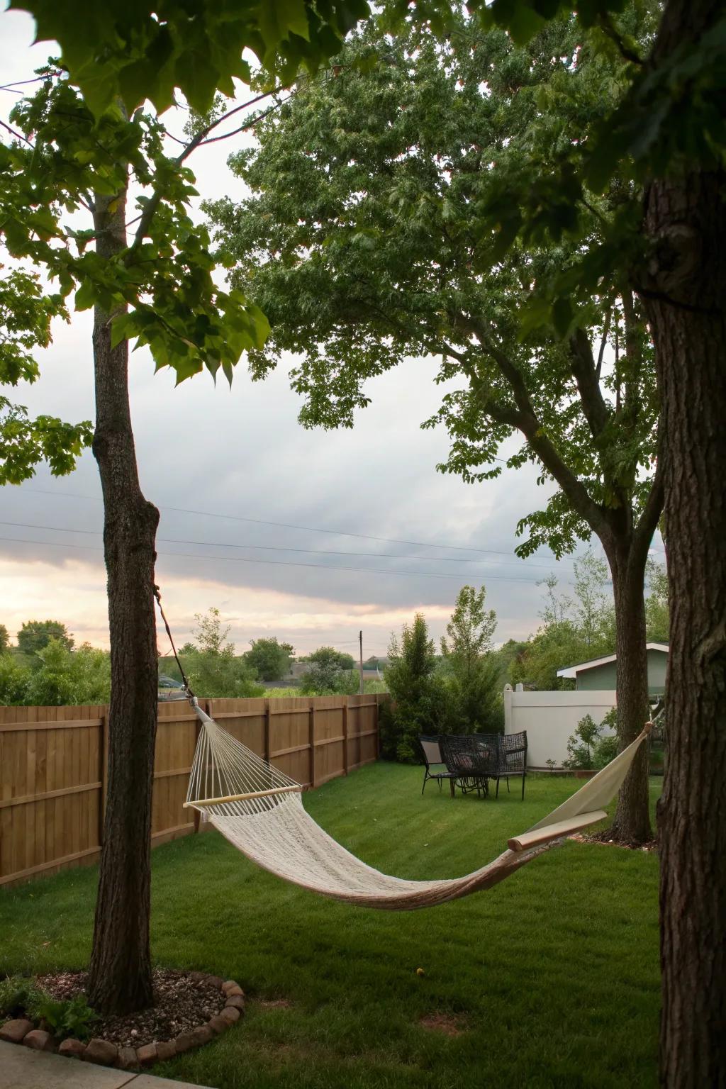 Hammocks extend a serene escape for relaxation in your backyard.