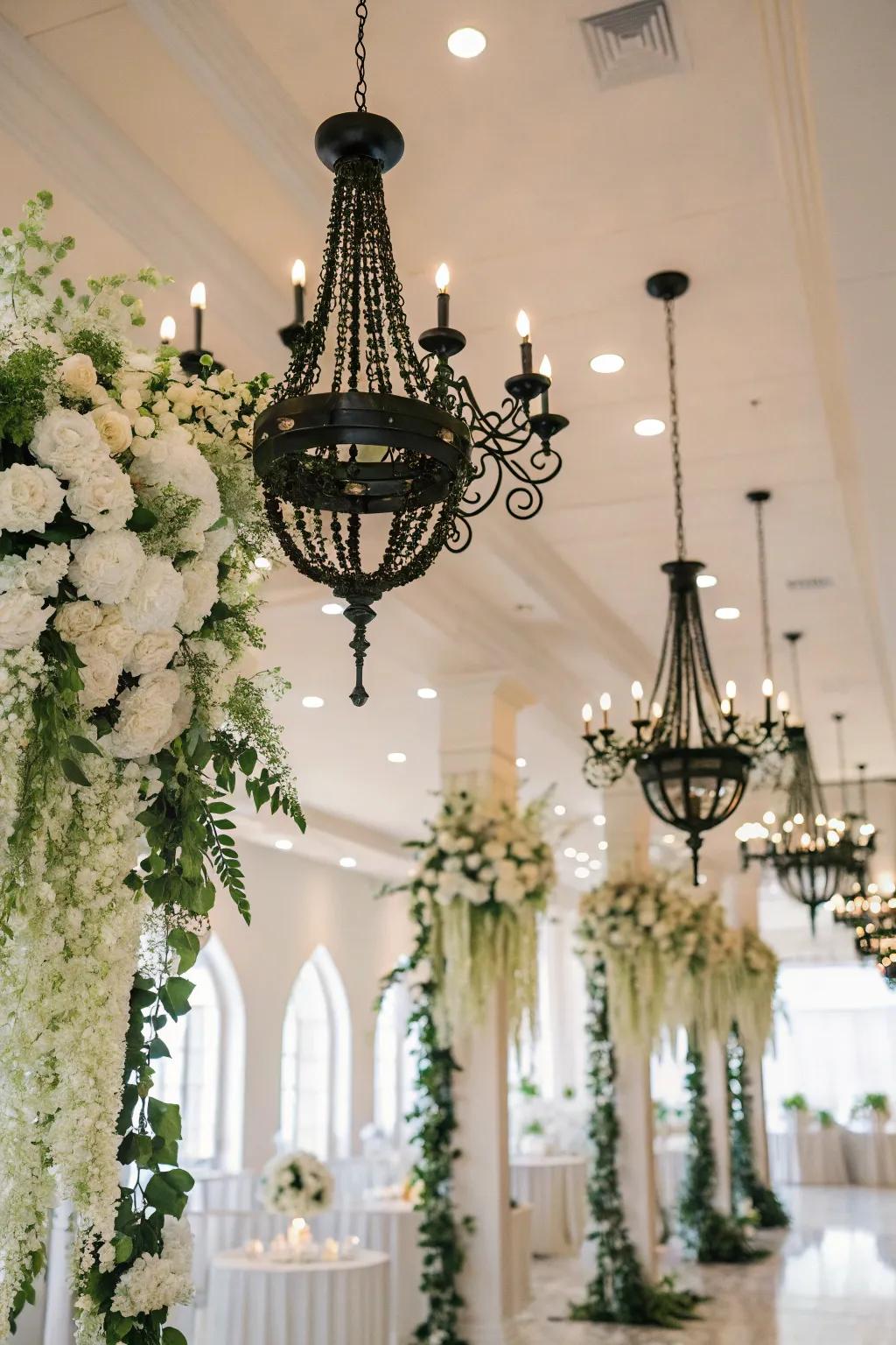 Floral chandeliers add a dramatic touch to the wedding decor.