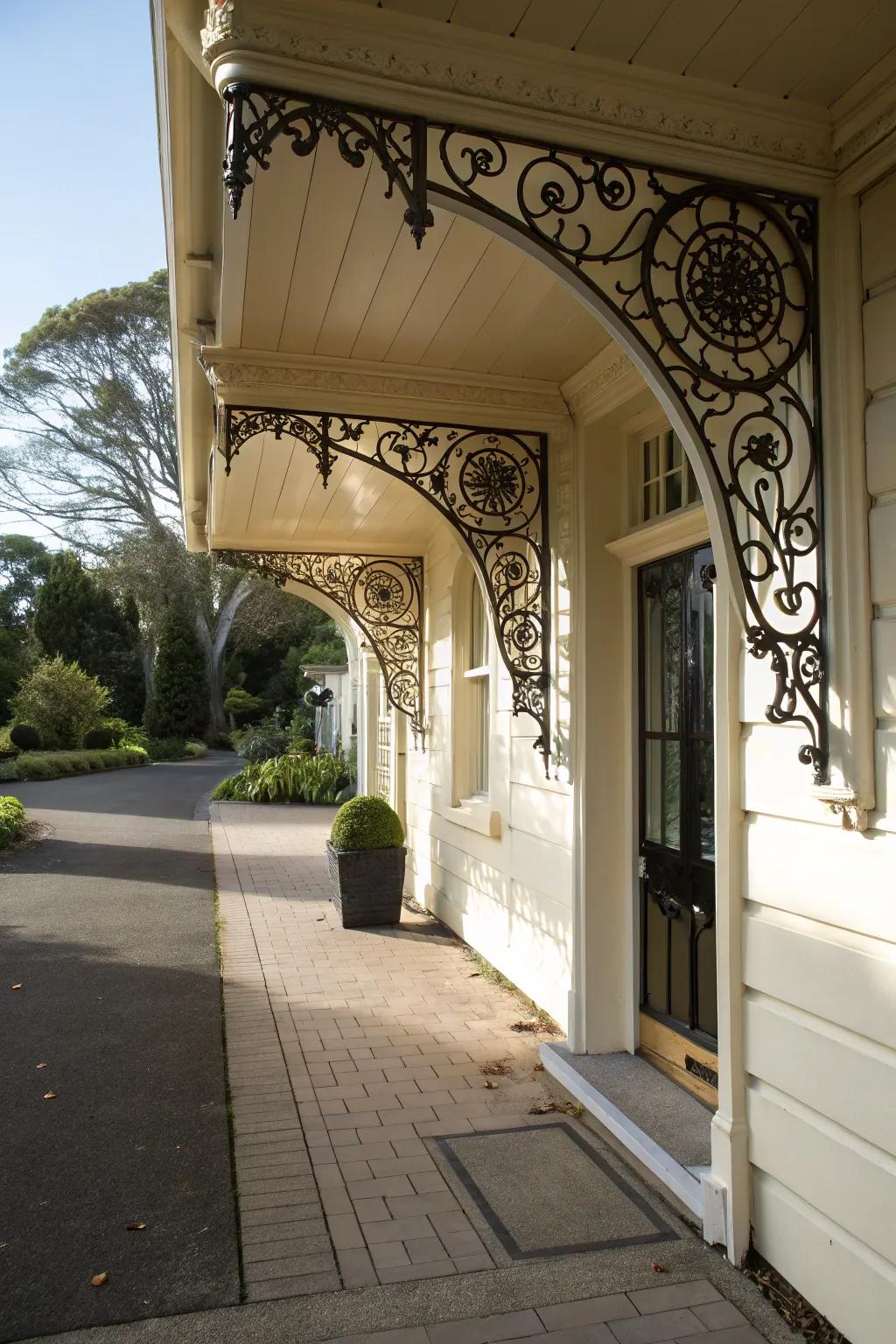 An entry featuring fancy mounts supporting an overhang.