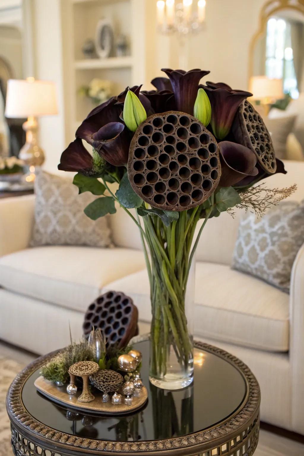 Lotus shells inject texture and intrigue into this somber Halloween floral piece.