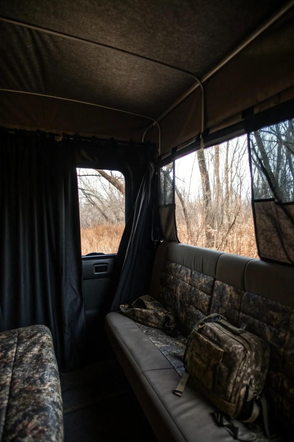 Blackout curtains control light and enhance stealth.