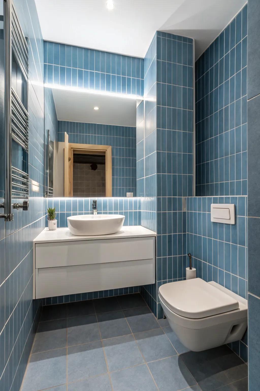 Minimalist blue tiles create a sleek and modern bathroom aesthetic.