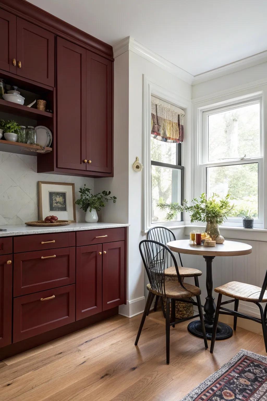 Welcoming kitchen nook featuring dark red cabinetry.