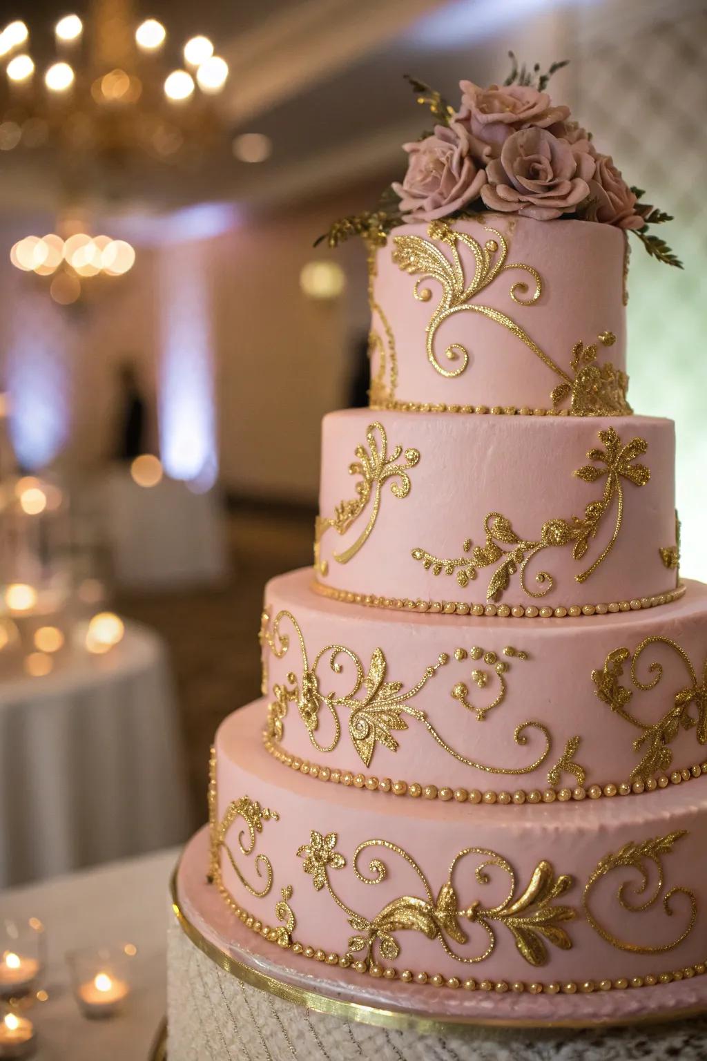Elegant soft blush and gold wedding cake.