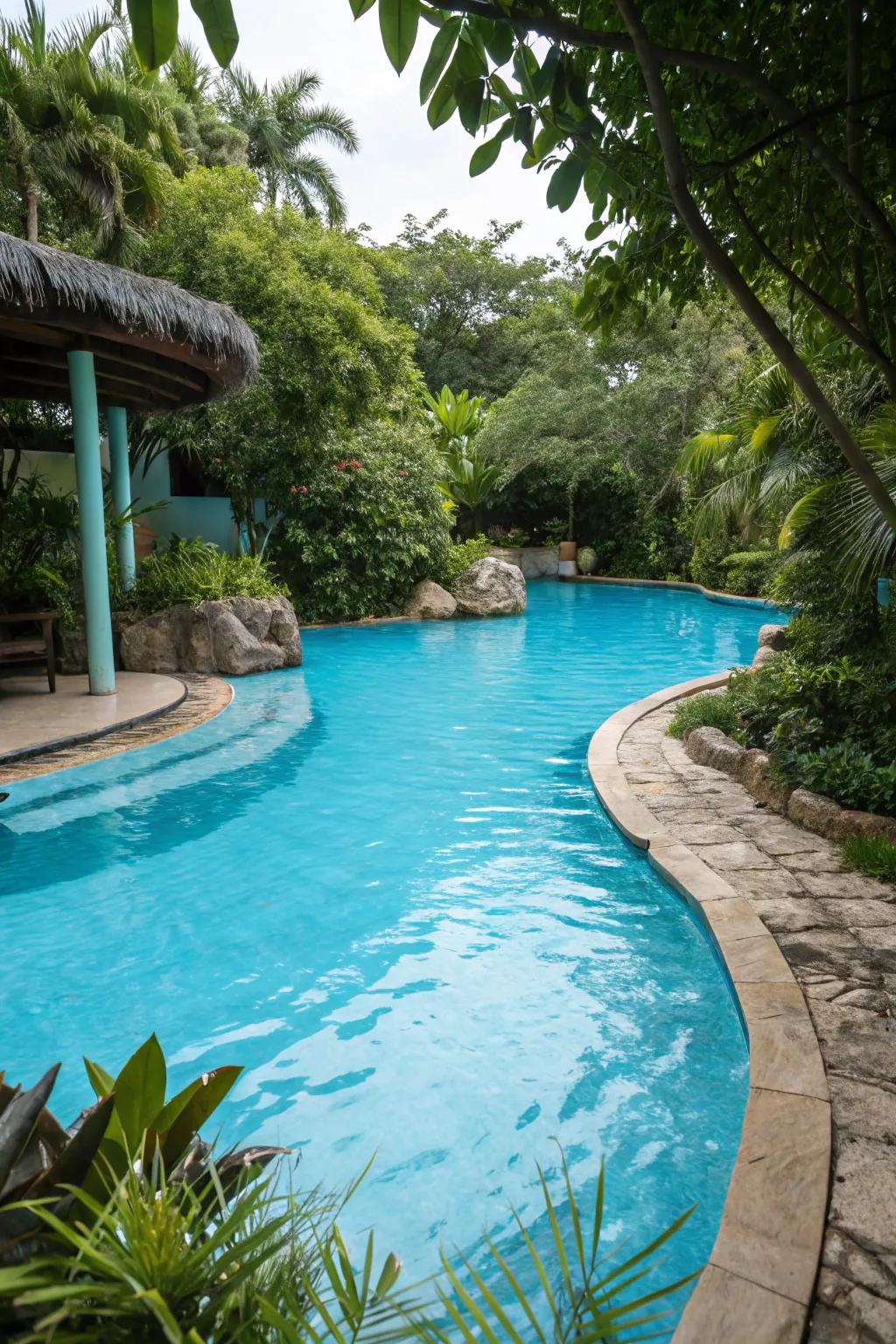 Lively plaster finishes elevate the tropical aesthetic of lagoon pools.
