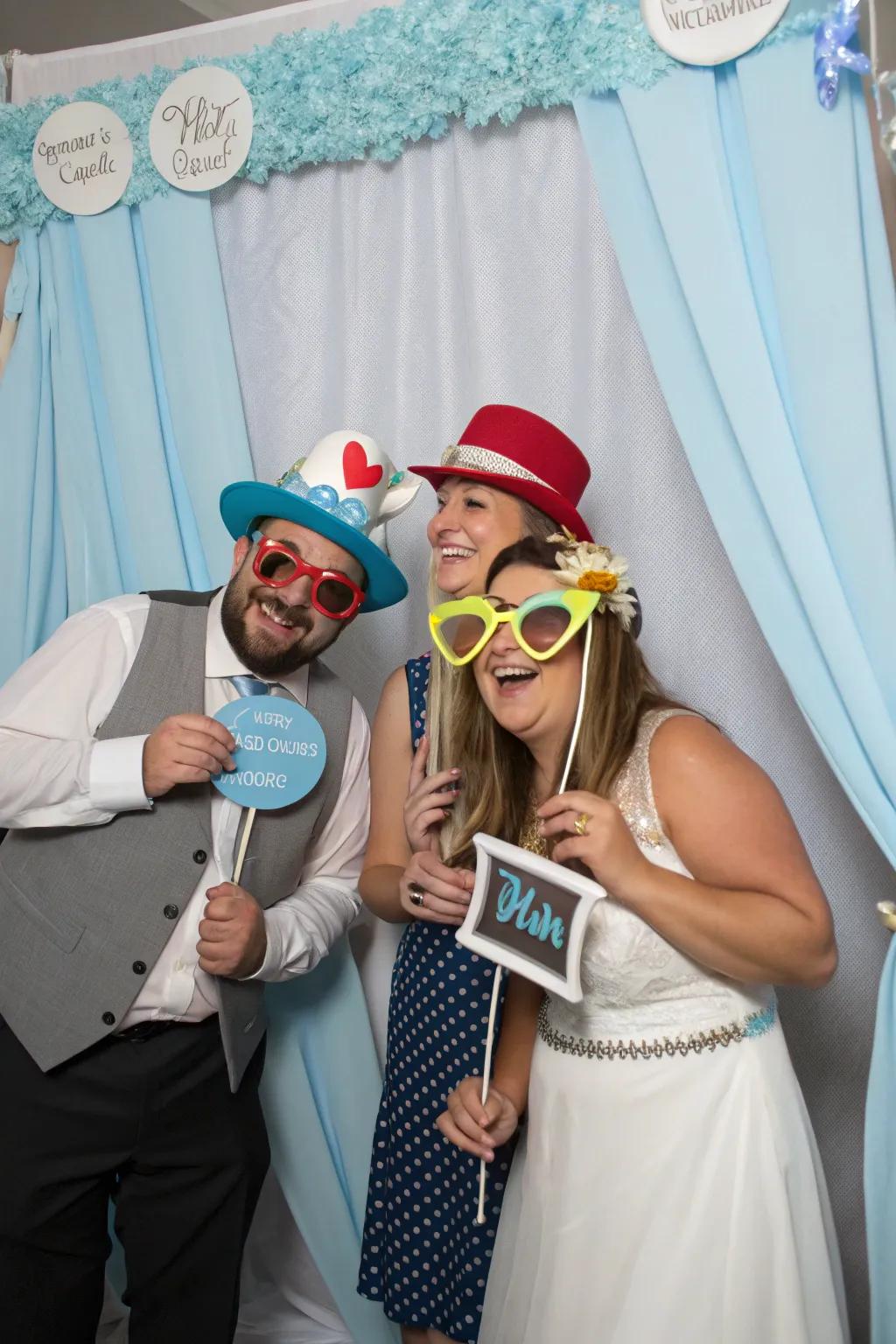 An azure-themed photo booth fashions amusing and unforgettable moments.
