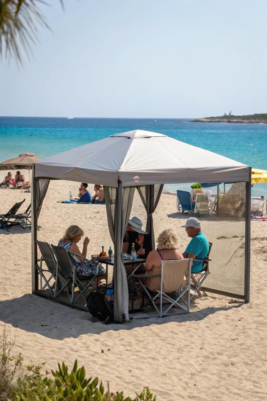 Moveable outdoor tents offer shade for beach groups.