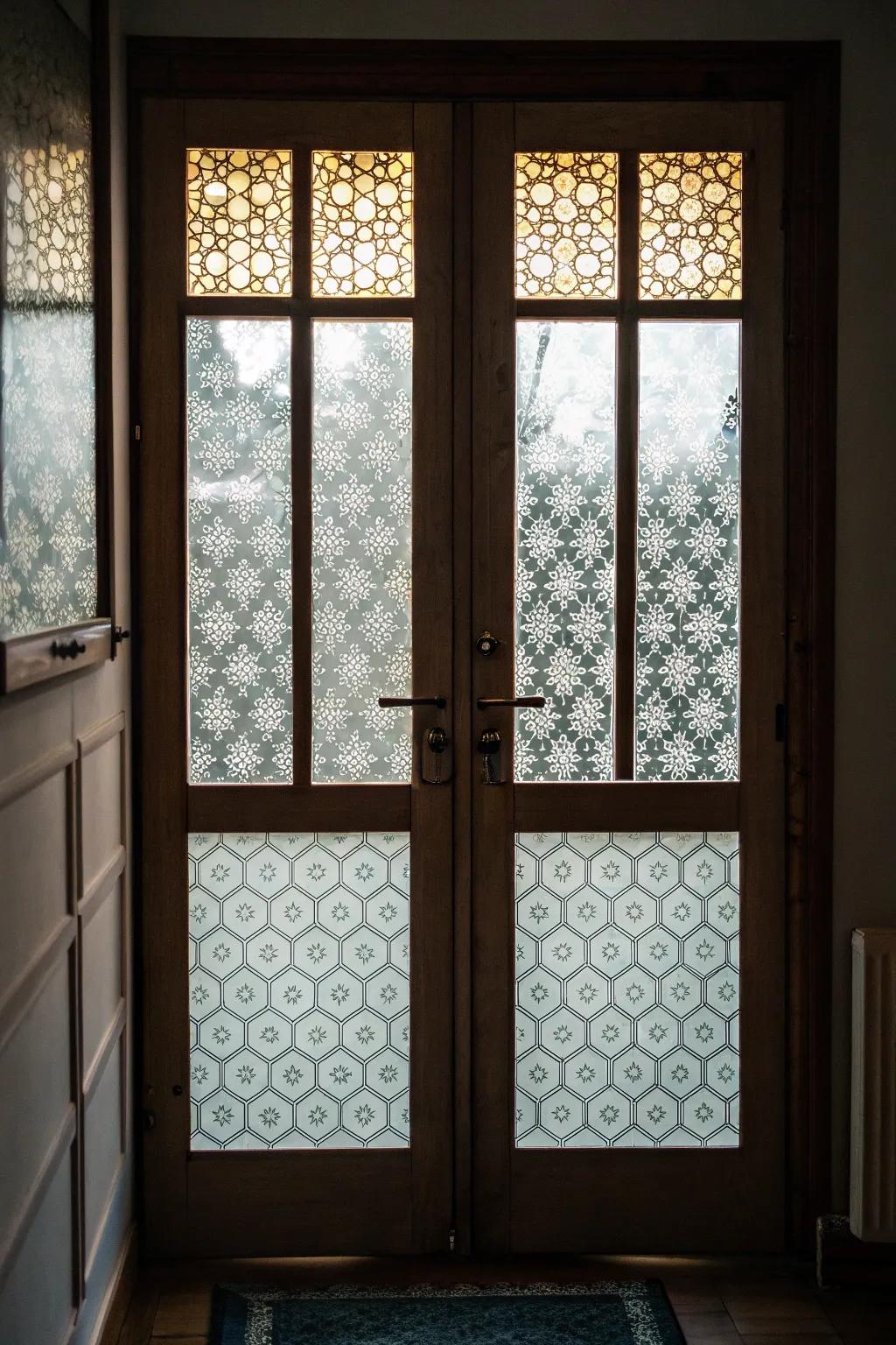 Patterned coverings append design and privacy to door windows without irreversible alterations.