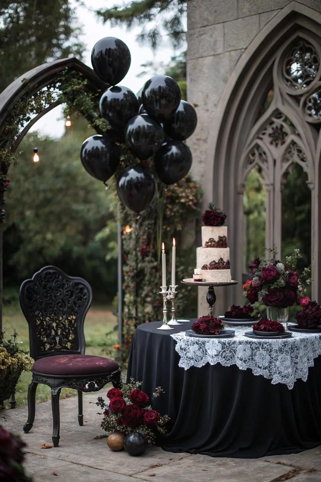A gothic wedding setup featuring sable balloons.