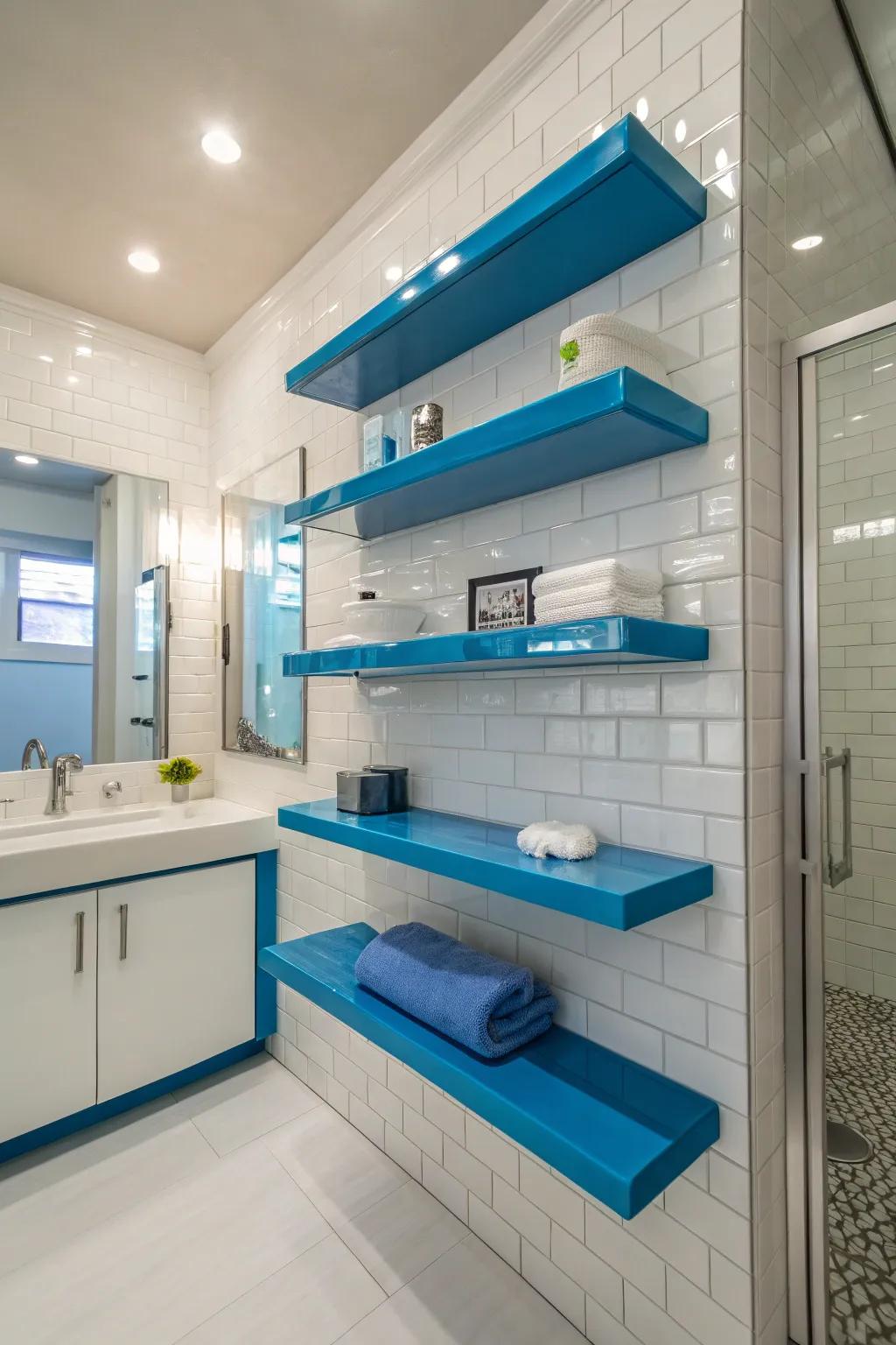 Bright azure floating shelves introduce panache and practicality to this chic washroom.