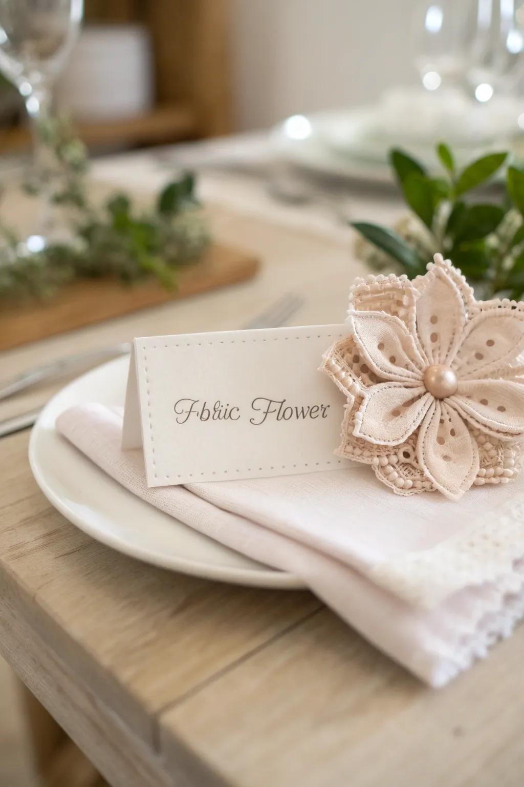 Elevate your table arrangement with these enchanting textile blossom table markers, harmonizing simplicity and elegance.
