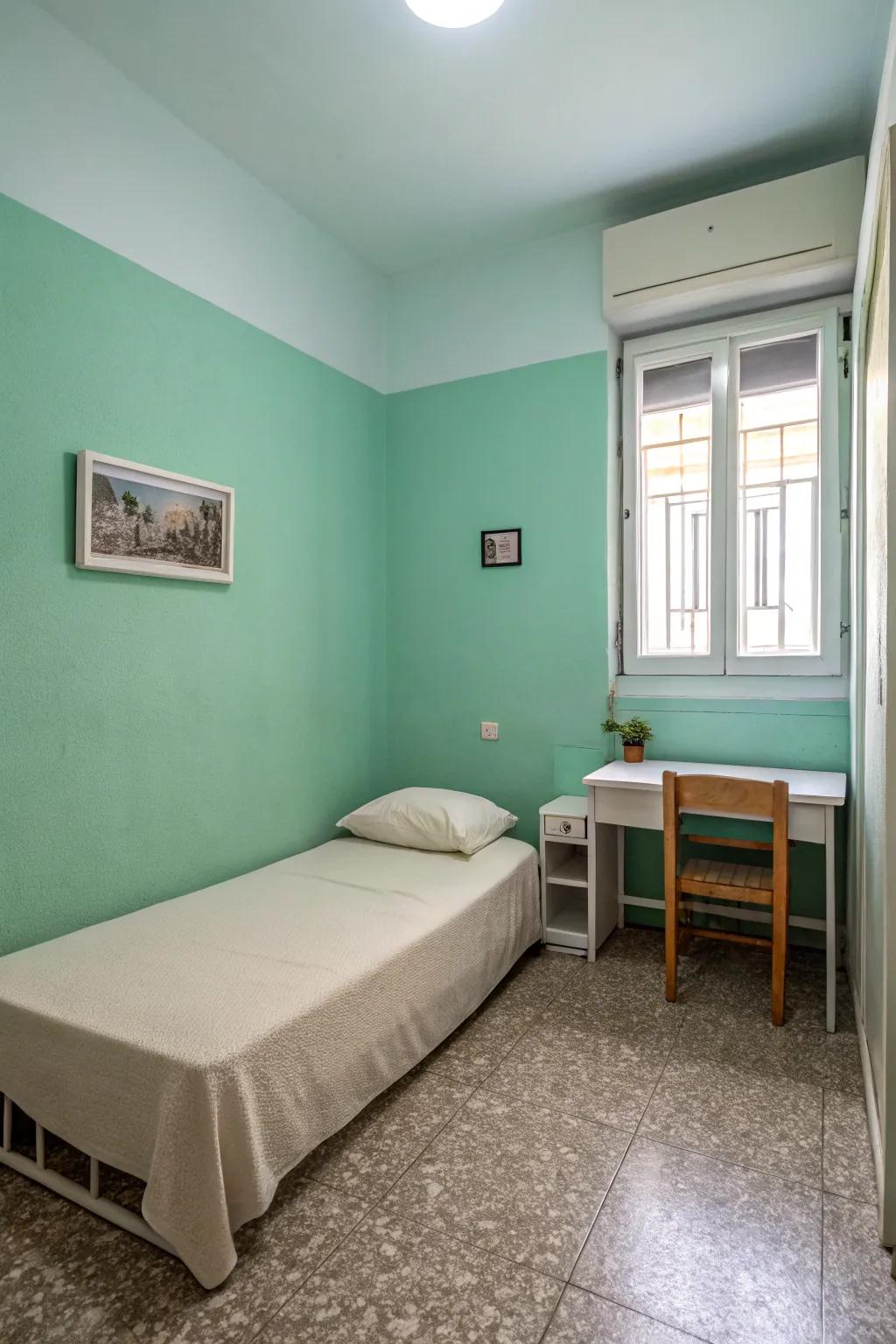 A minimalist haven with subtle seafoam green walls.