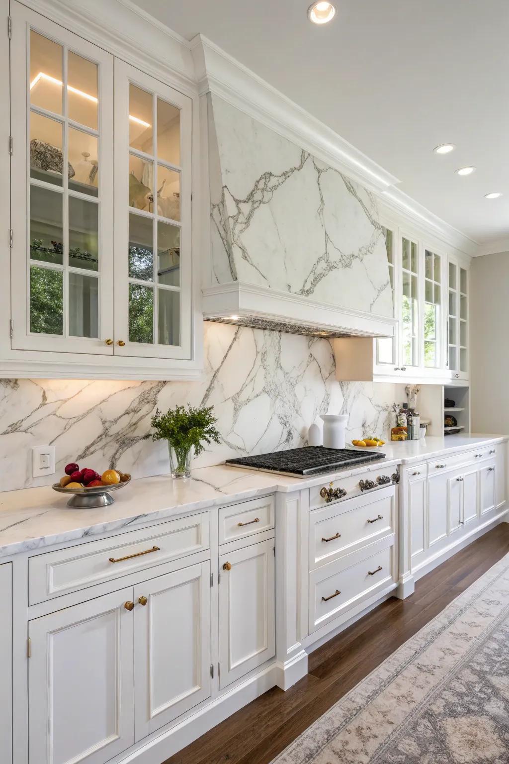 Stone backsplashes impart an aura of sophistication in this white kitchen.
