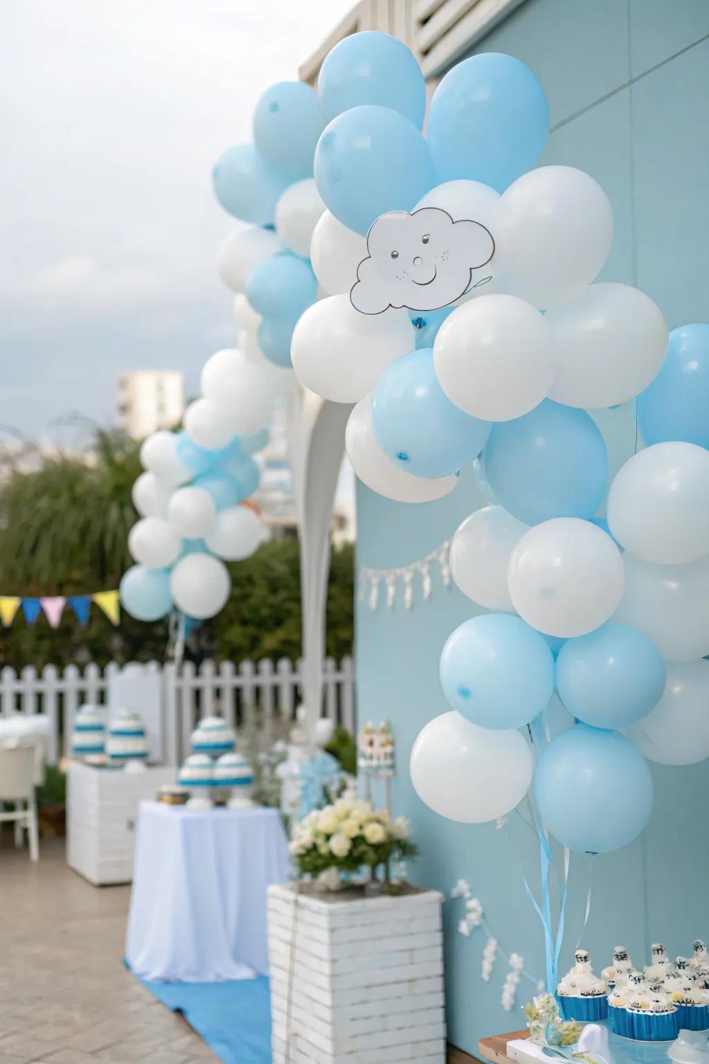 Balloon formations evoke a cloud-like impression, adding a whimsical detail to the baby shower décor.